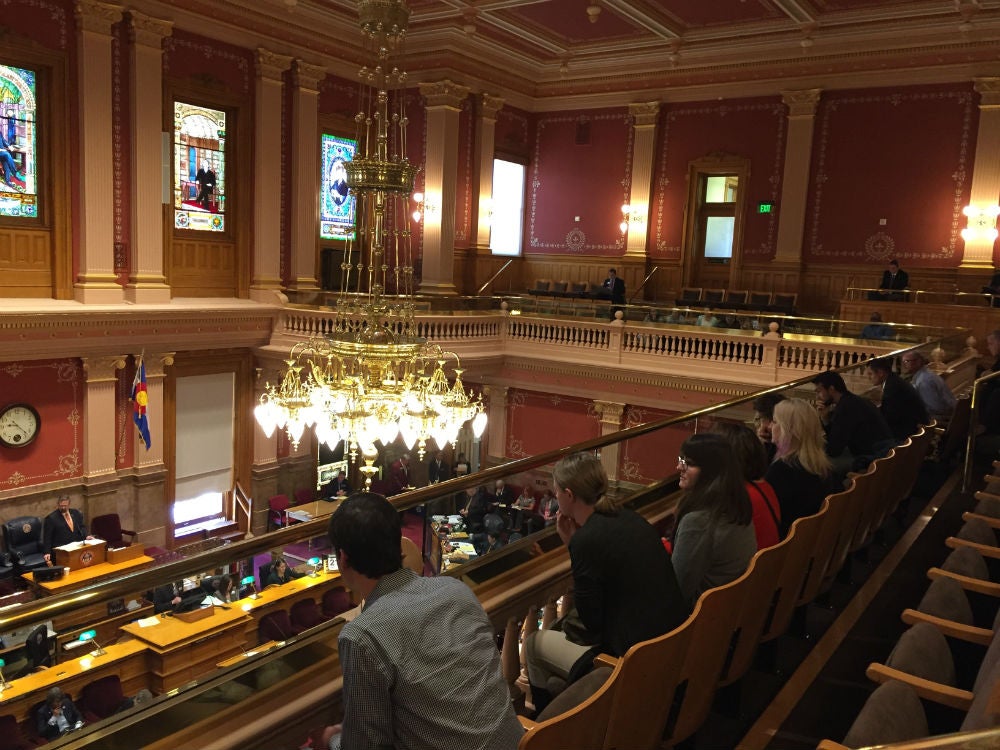 Staff Council members listen to Senate floor work