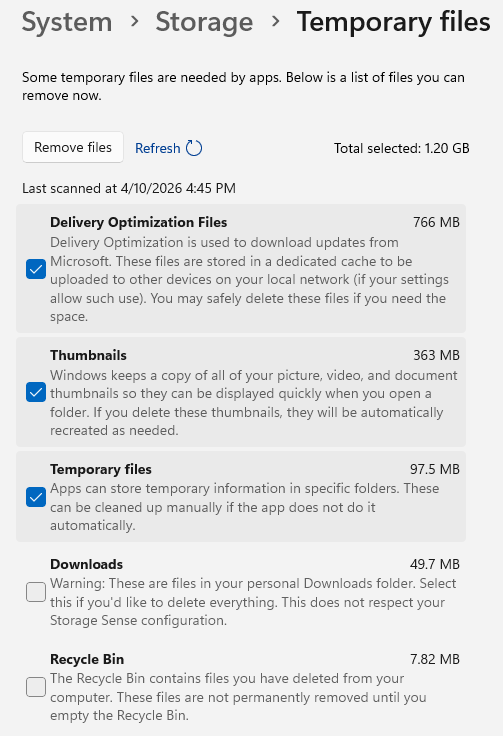 Windows Temporary files settings page showing a list of file categories (Delivery Optimization Files, Thumbnails, Temporary files, Downloads and Recycle Bin) with checkboxes to select items for deletion and a “Remove files” button at the top.