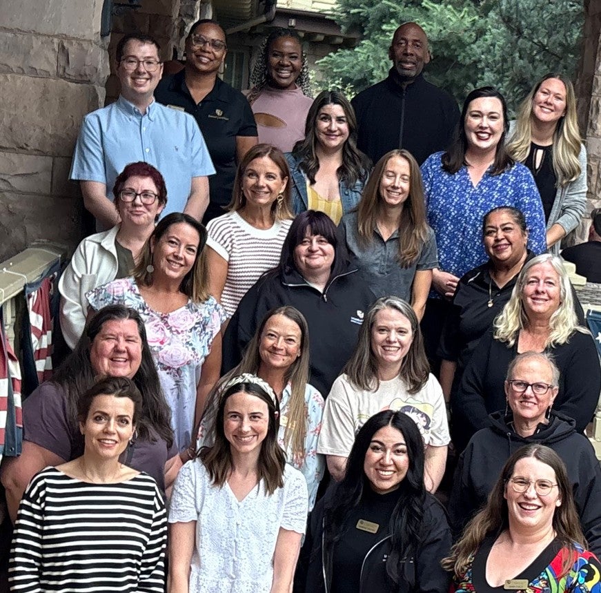 A group image of the UCSC Representatives for 2025-2026 standing on an outdoor brick staircase. 