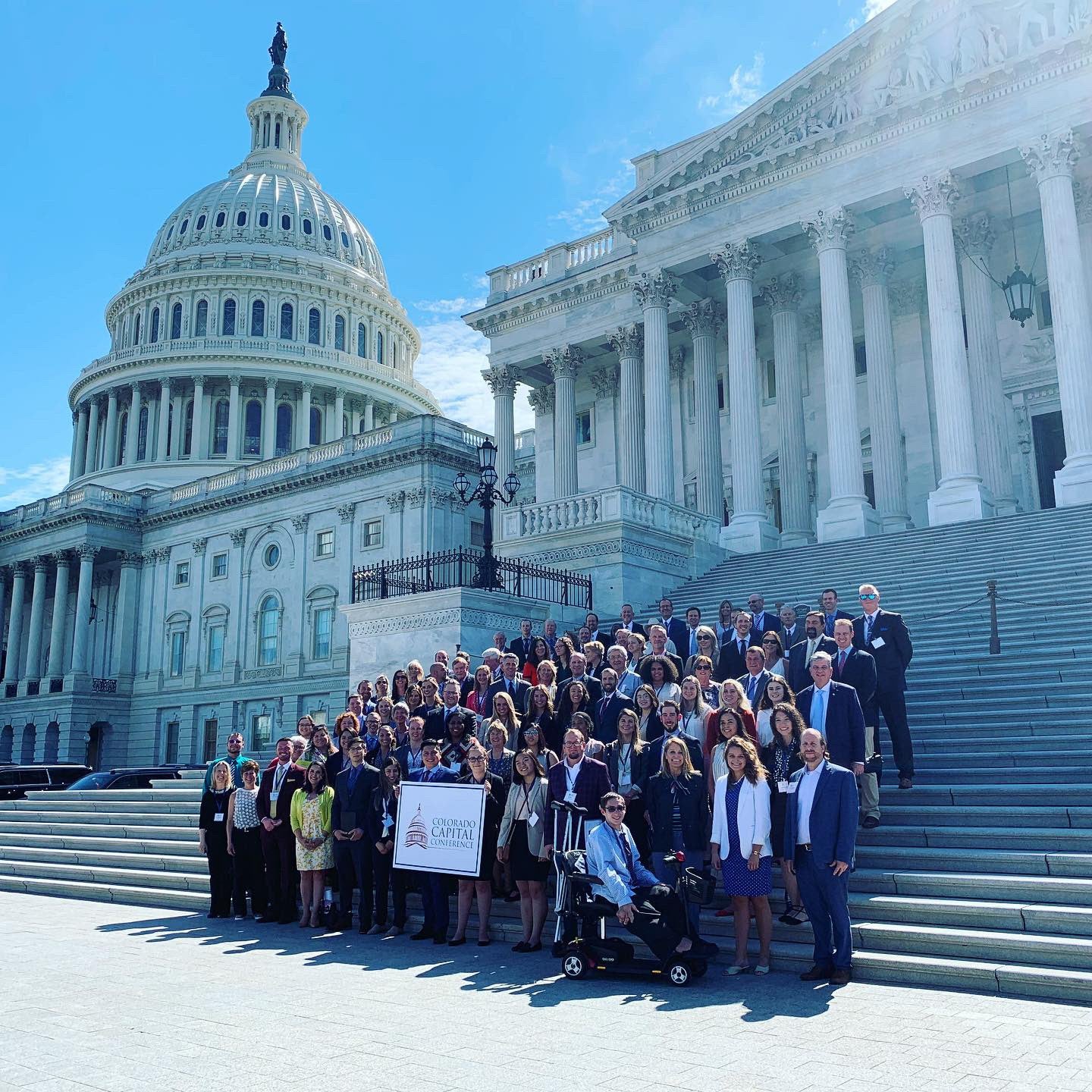 Group photo of the participants on the steps of the U.S. Capitol Building at the 2019 Colorado Capital Conference