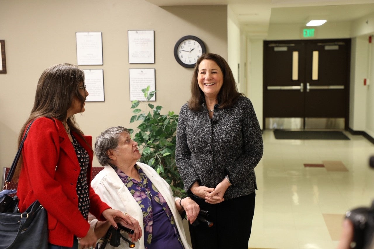 Congresswoman Diana DeGette speaks with patients at Sheridan Health Services