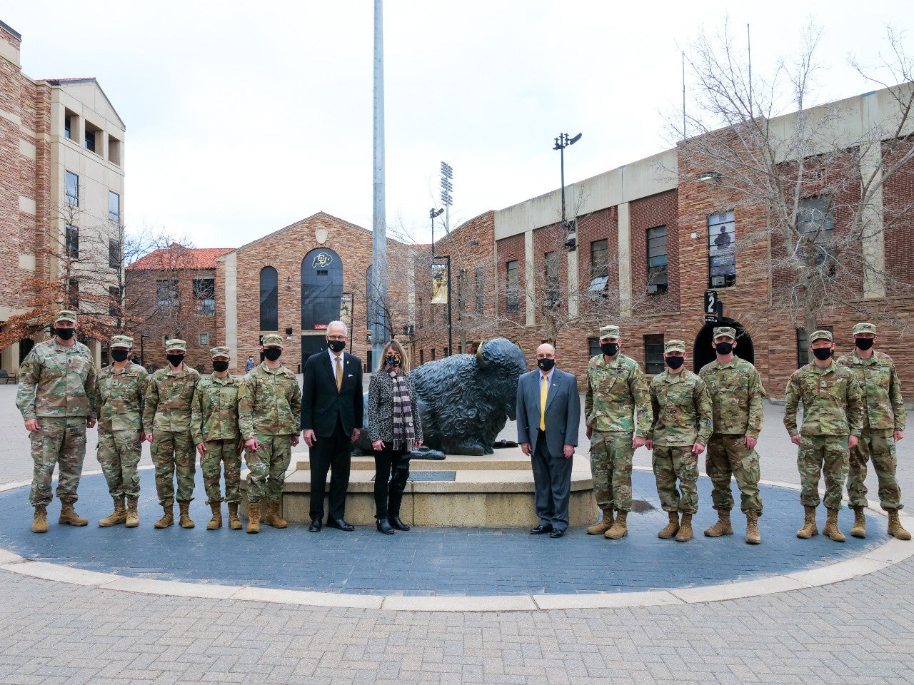 CU President Mark Kennedy, Regent Sue Sharkey, CU Boulder Chancellor Phil DiStefano with Maj. Gen. Matthew McFarlane and Golden Buffalo Battalion Army ROTC. 