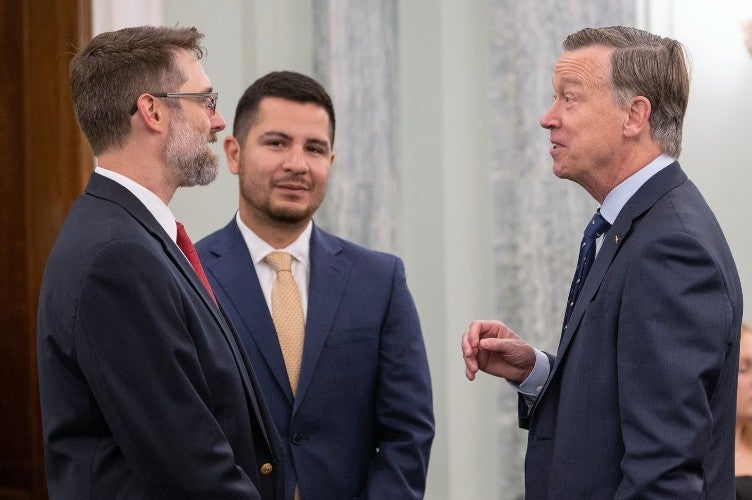 ate Professor Dr. Marcus Holzinger and Colorado Senator John Hickenlooper in Washington, D.C.