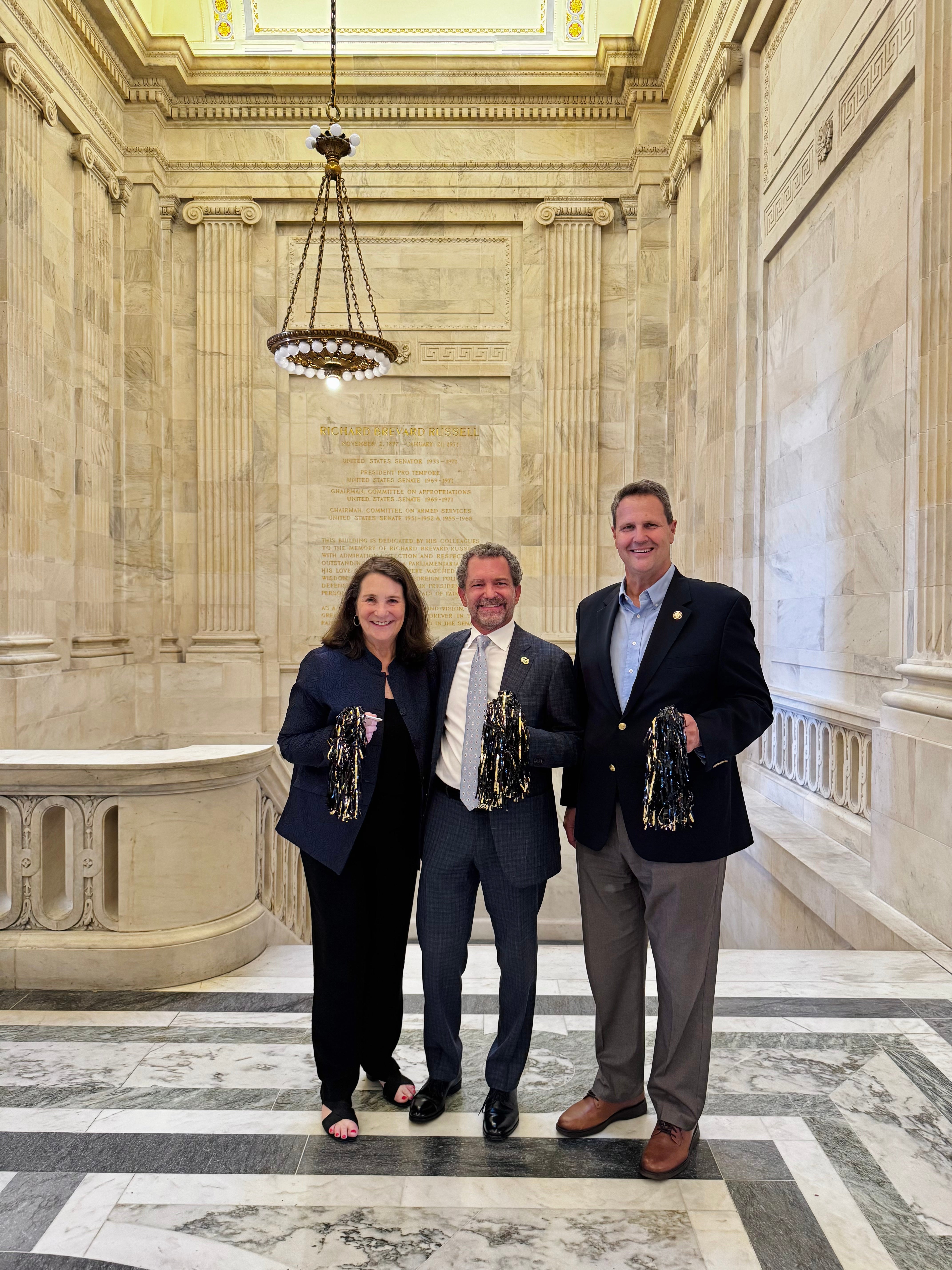 CU President Todd Saliman poses for a photo inside the U.S. Capitol with Rep. Diana DeGette (D-CO) and Rep. Jeff Crank (R-CO).
