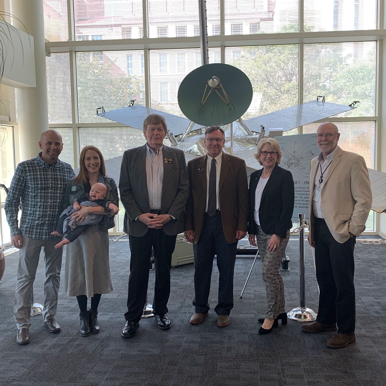 Representative Mark Baisley and Randy Siders (Director, LASP) with Debbie, Charlie, and Alison Kennedy