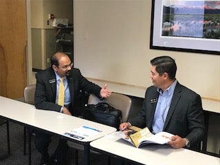 UCCS Chancellor Reddy speaks with Representative Donald Valdez (D-La Jara)