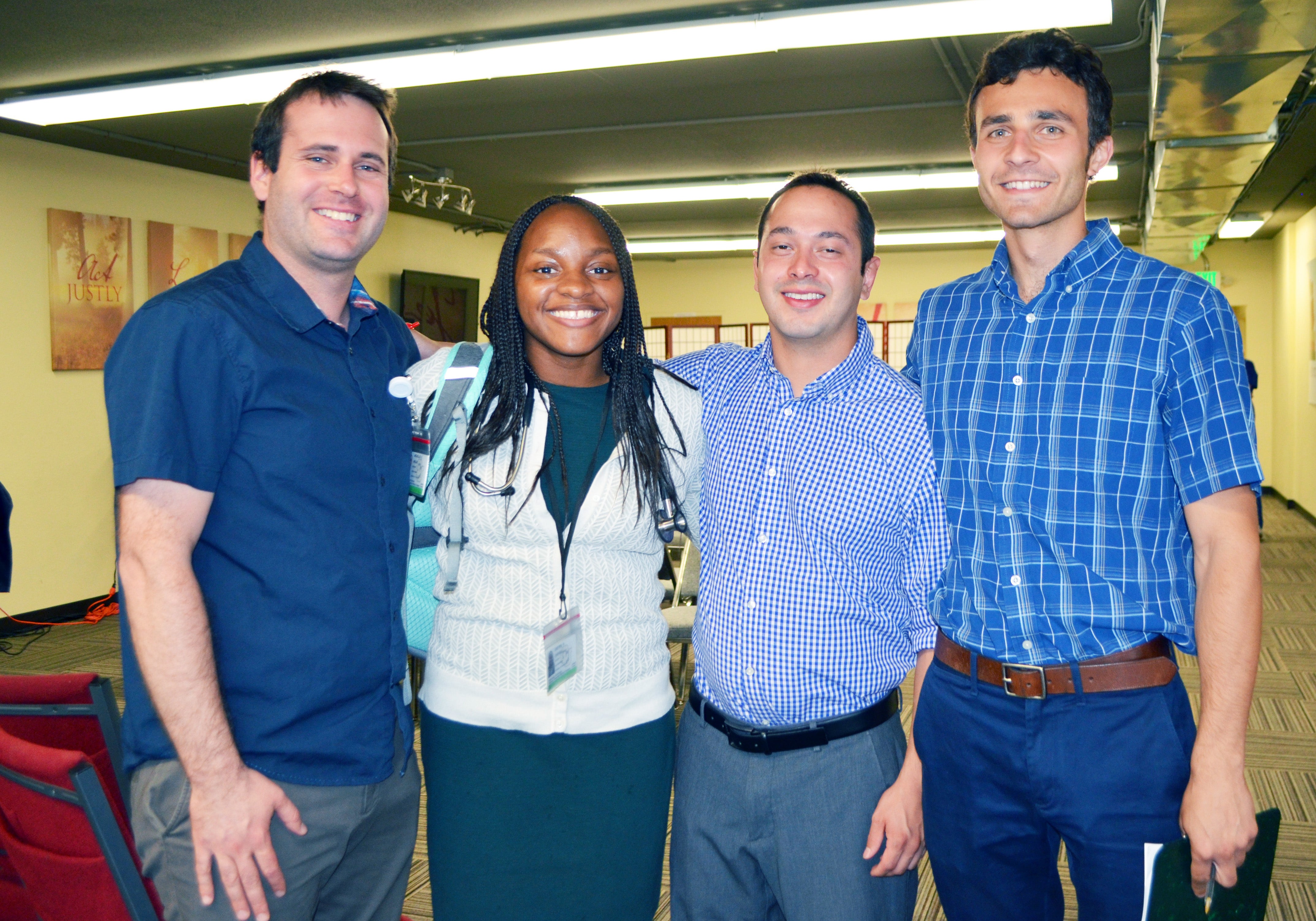 Student volunteers, from left, Nick Arlas, Josten Overall, Joaquin Quintana and Andrea Mariani