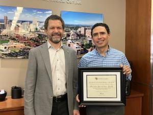 Marcelo Perraillon and President Todd Saliman