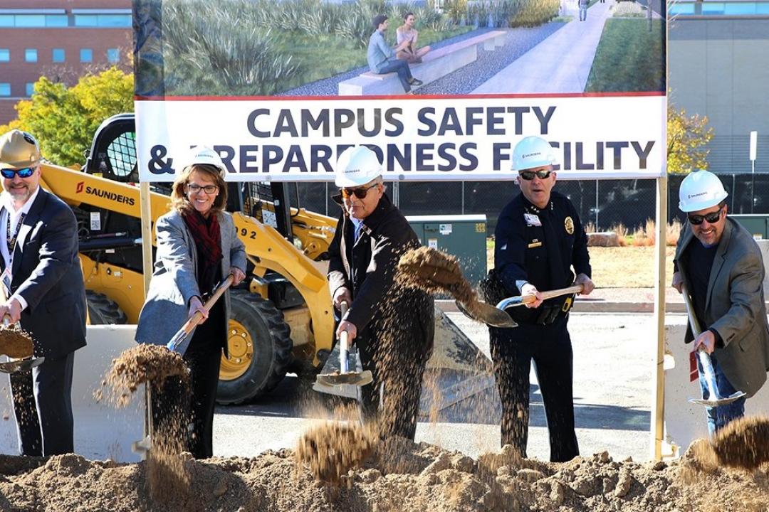 Photo of Jay Campbell, Terri Carrothers, Don Elliman, Randy Repola, James Taylor breaking ground at Anschutz ceremony.
