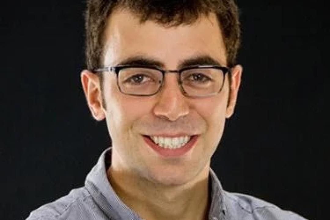Adam Kaufman smiling portrait photo
