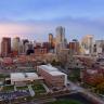 Photo of the Denver skyline taken near dusk.