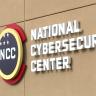 national cybersecurity center sign on side of tan building 