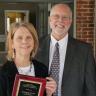 Joanne Guillery and group with award 