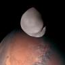 A striking view of Mars and its smallest moon, Deimos. This composite was created from several images taken by the EXI instrument aboard the Emirates Mars Mission when it traveled within about 100 km of Deimos. Credit: Emirates Mars Mission