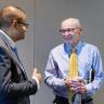 Provost Russ Moore speaks with Leeds School of Business Dean Vijay Khatri at the New Faculty Welcome event at the SEEC building on Aug. 19, 2024. (Photo by Glenn Asakawa/CU Boulder)