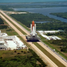 The Challenger space shuttle is transported to the launch pad in December 1985, about a month before the fateful launch. (Credit: NASA)